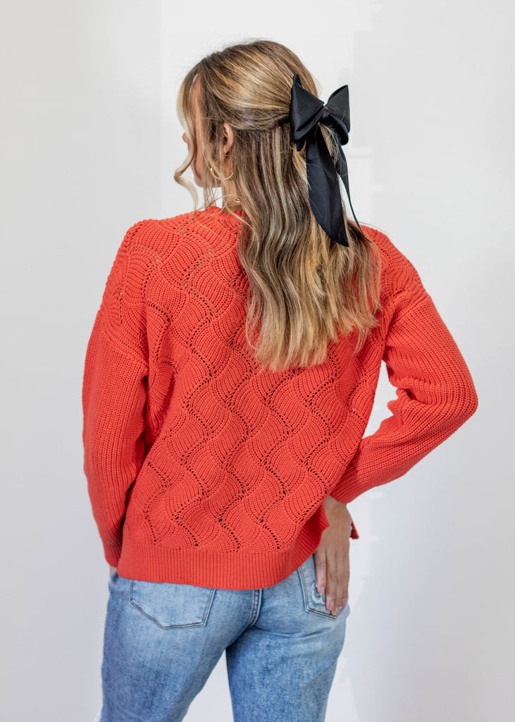 sunset orange scallop design sweater