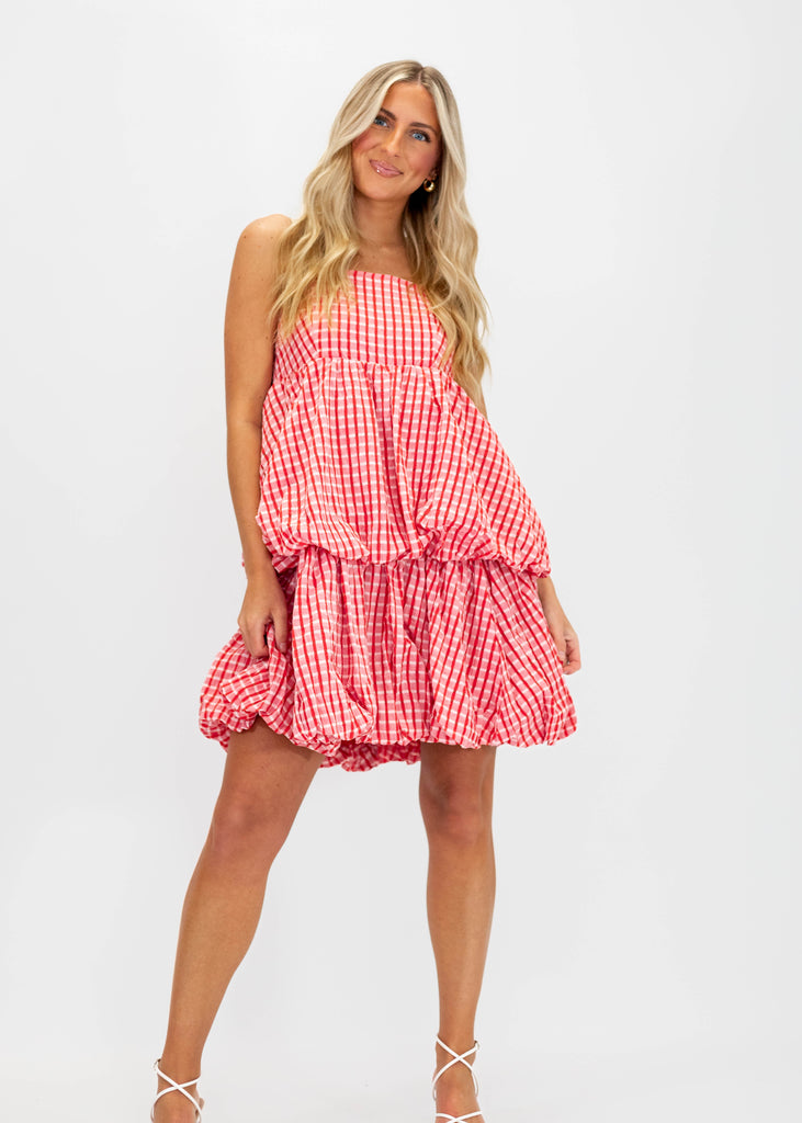 red plaid babydoll fit dress with puffy tiered design