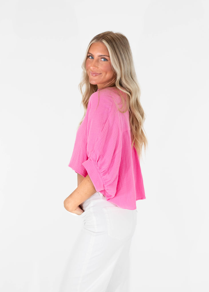 pink cropped button down shirt