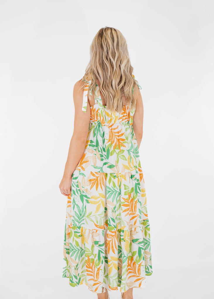 white maxi dress with green and orange floral