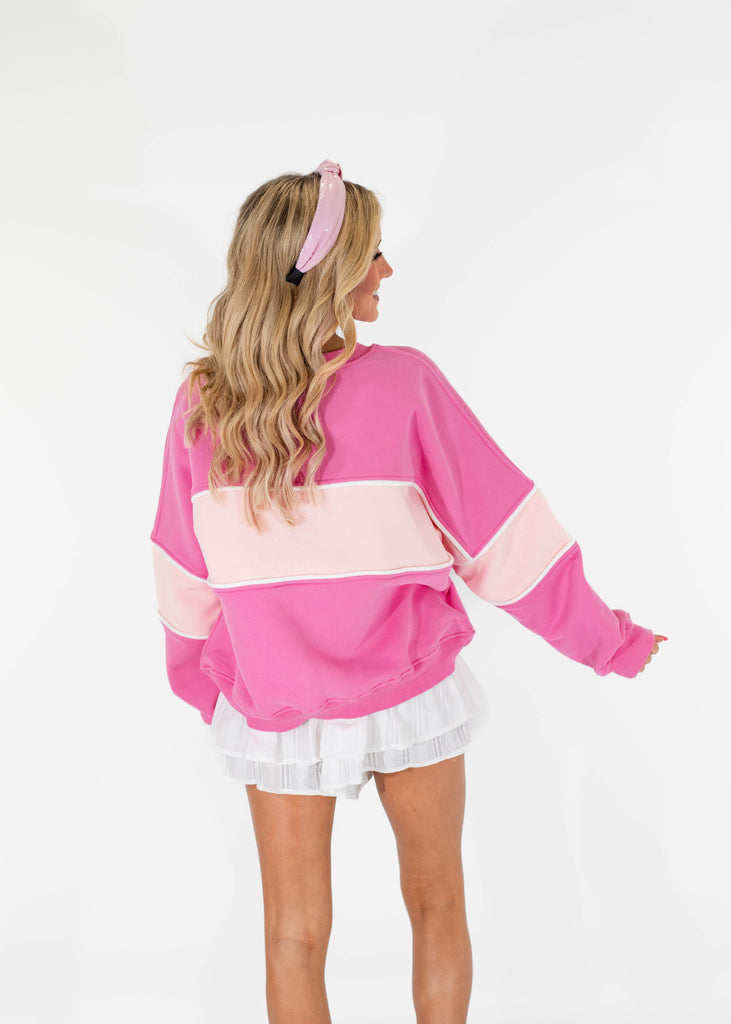 pink sweatshirt with light pink stripe