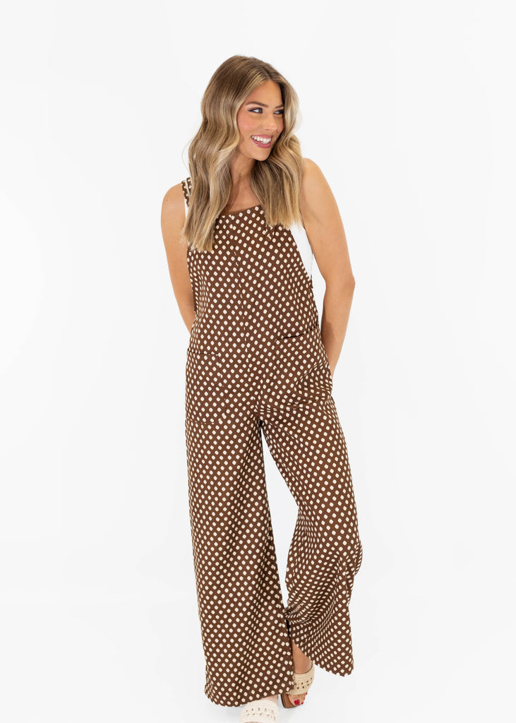 brown polka dot jumpsuit with wide legs and pockets