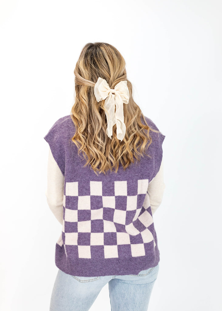 purple checkered sweater vest with buttons