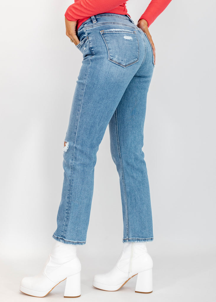 medium wash high rise ankle length distressed slim straight jeans